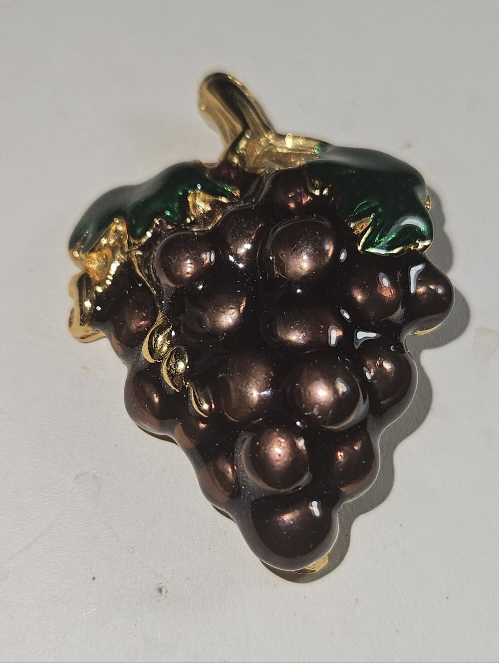 Gold-Tone Brown Grape Cluster Brooch with Green Accents